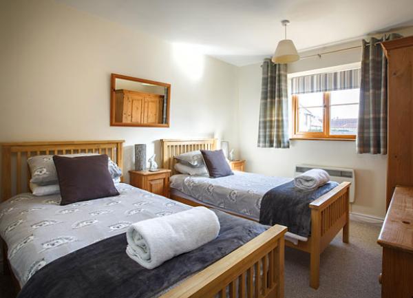 Stable End holiday Cottage, Weybourne in Norfolk twin room.