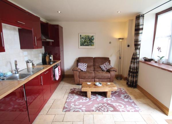 A kitchen in a stable block now converted to a Porlock holiday cottage for two.