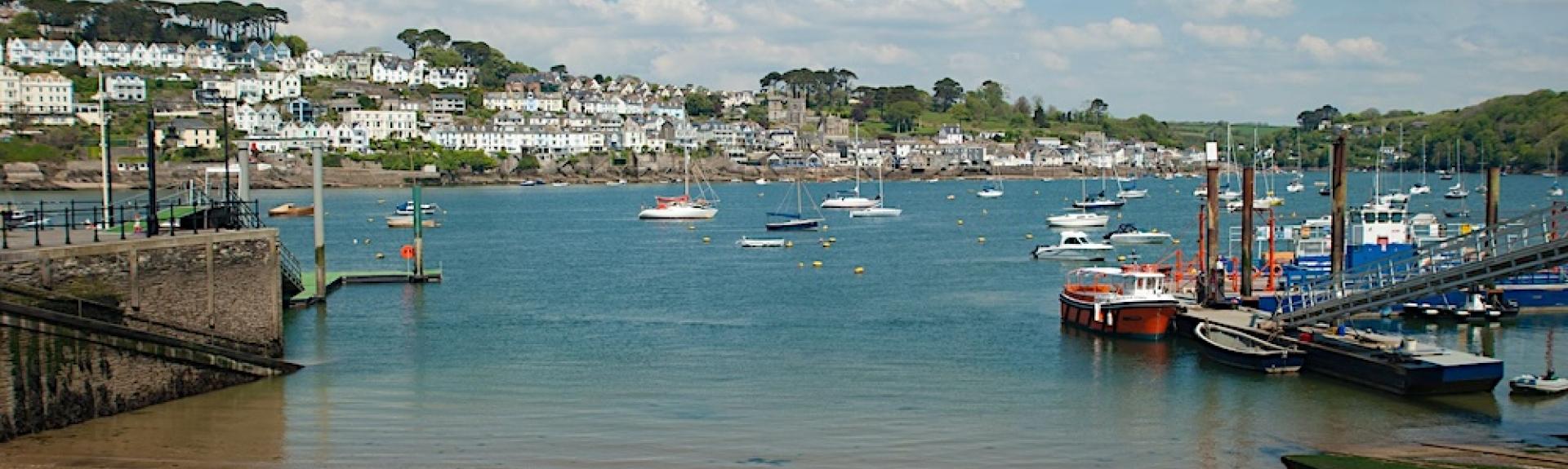 A distant view of the estuary and waterside houses  in Fowey.