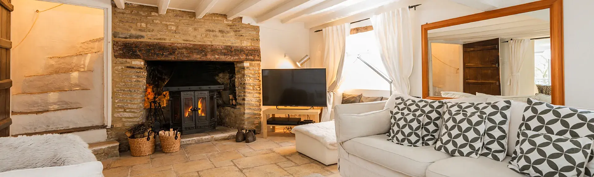 Comfortable lounge area with fire.