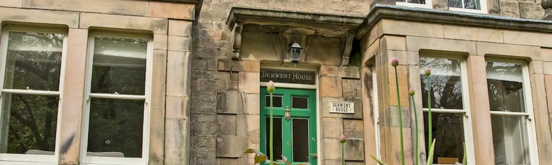 Exterior and front garden of a 3-storey Georgian town house.