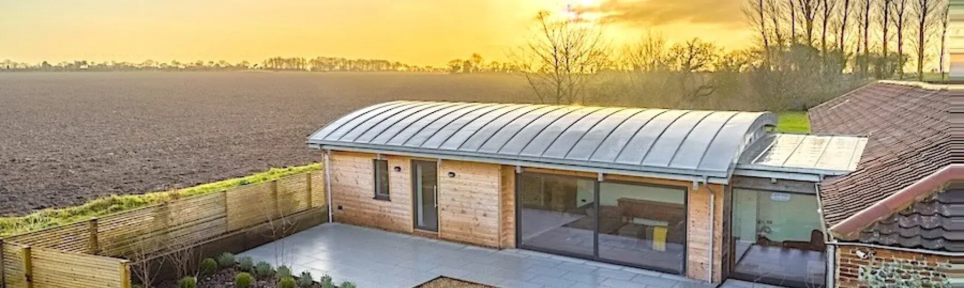 1. A contemporary barn conversion surrounded by open countryside.