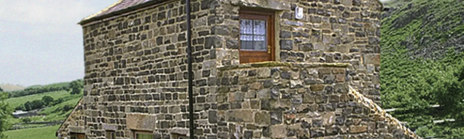 A remote 2-storey barn conversion in a moorland location.
