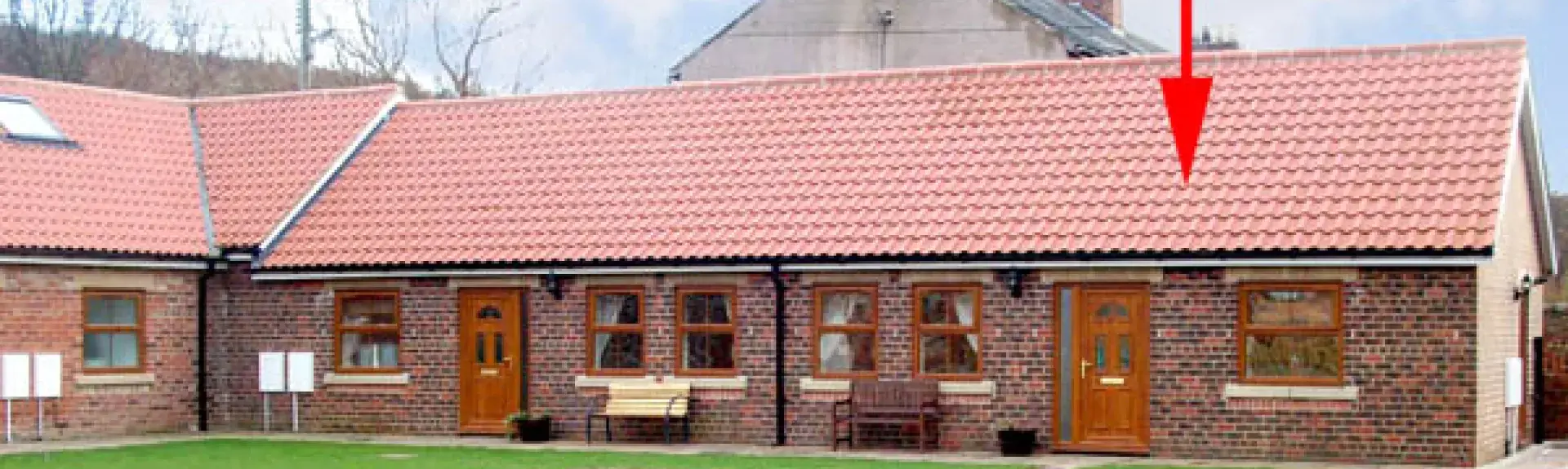 Exterior of a single-storey seaside holiday cottage in Skinningrove.