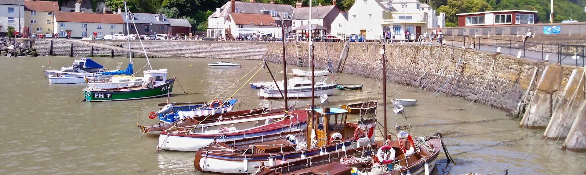 Fishing boats and small craft moored in rows in Minehead harbour