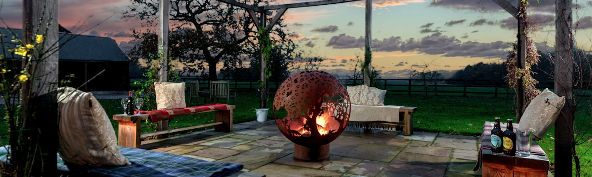 Holiday cottages in the Yorkshire Wolds: The terrace at Broadgate Farm in the sunset - A Luxury Holiday Cottage.