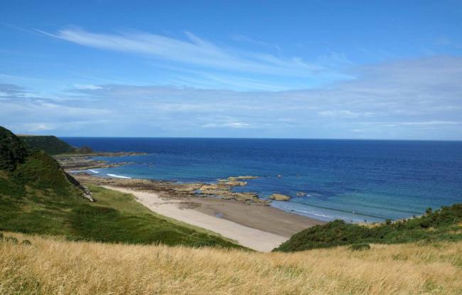Image credit: The Old Customs House in Banff View of low grassy hills sloping down to a small beach in Banff, Aberdeenshire