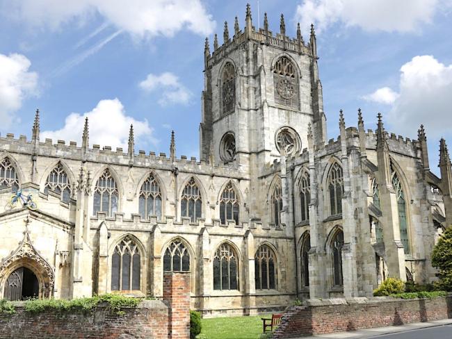 Holiday Cottages in Bevrerley The exterior of a grand Gothic-syle cathedral in Beverley.