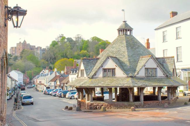 Dunster, A Historic Village on the West Somerset Coast The Yarn Market and Castle sit at opposite ends of Dunster's High St.