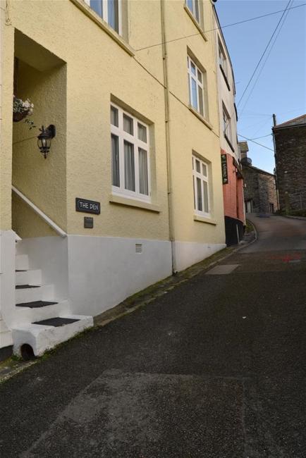 Exterior of a 3-storey townhouse on a quiet lane in Looe.