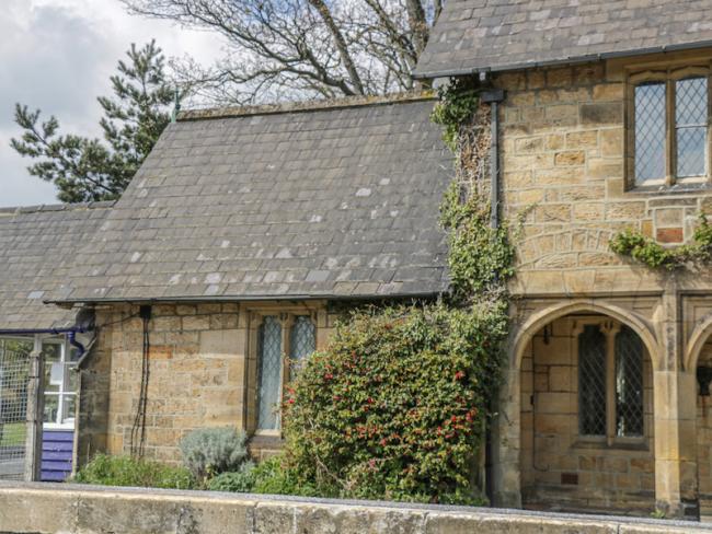 Exterior of a heritage railway station building in North Yorkshire.