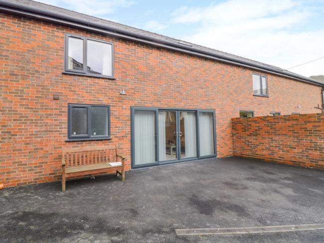 Semi-detaachd, brick holiday home in caersws with off-road parking spaces.