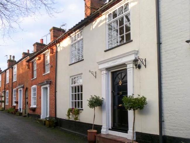 Exterior of an 18th-century terraced holiday cottage in Aylsham.