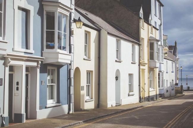 A row of Victorian town houses leading to the sae in Tenby.