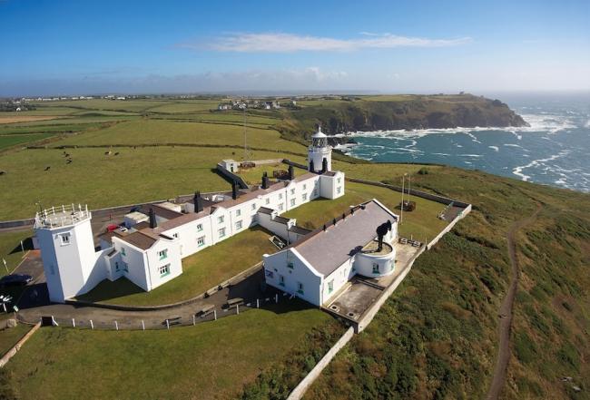 Godrevy Lighthouse complex in a clifftop location.