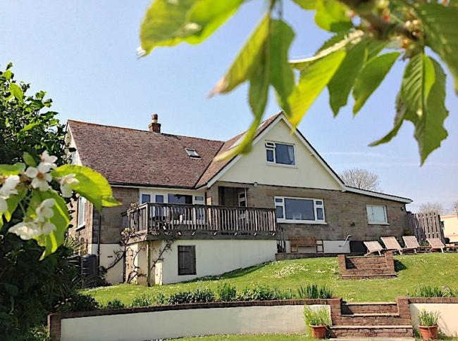 Large 3-storey contemporary holiday home with well-kept gardens.
