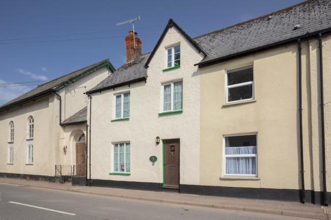 Interior and exterior photos of Chapel Cottage, a double-fronted Exmoor holiday cottage in Exford.