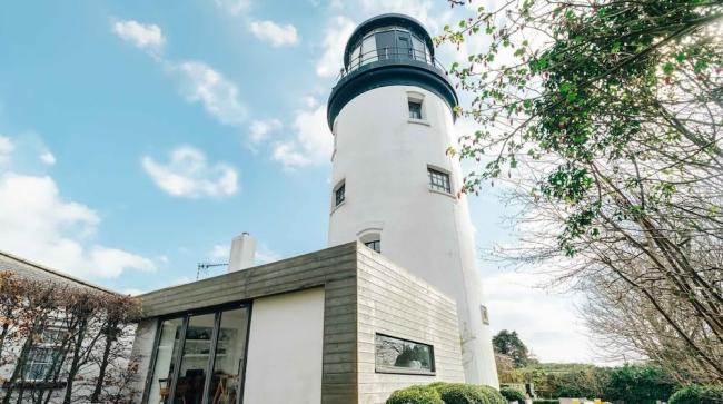 Exterior of a Norfolk lighthouse converted to a luxury holiday home.
