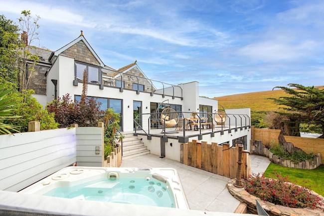 A large rural cottage with 3 terraces, gardens and a hot tub.