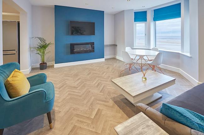 Stylish  bay-windowed lounge with seafront views.