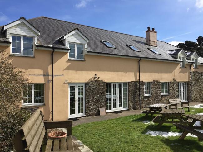 A row of two terraced holiday cottages in North Devon