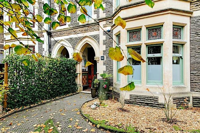 Bay windowed ground floor exterior of a Victorian townhouse