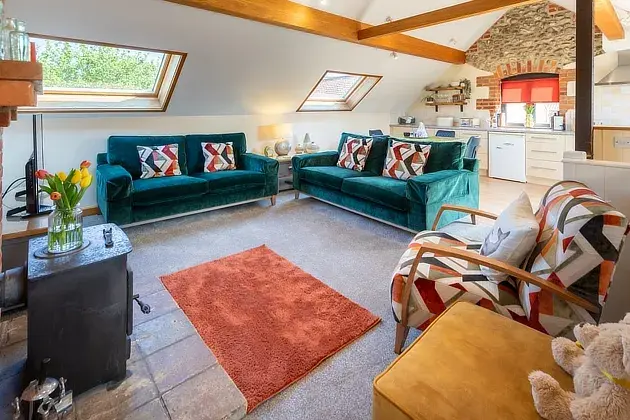 Lapwing holiday cottage in Weybourne, Norfolk lounge and kitchen.