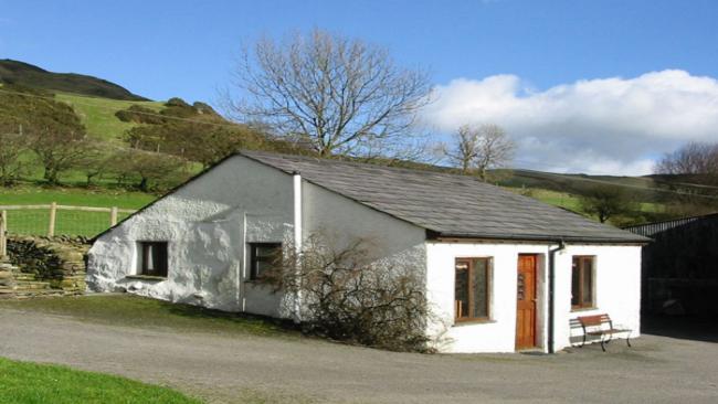 A holiday bungalow with off-road parking in a remote rural location.