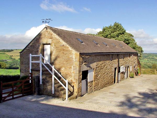 A 2-storey barn conversion with a courtyard and far-reaching rural views
