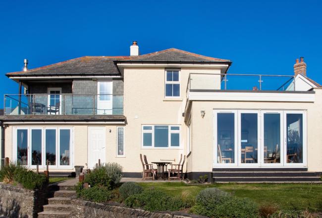 Large cottage with balcony and floor-to-ceiling French windows in Padstow.