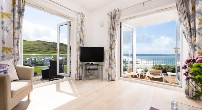 Glorious Sea Views from Sunnycliffe House, a luxury Woolacombe holiday cottage. Sea views through two set of French windows from the lounge of a holiday home above Woolacombe beach.